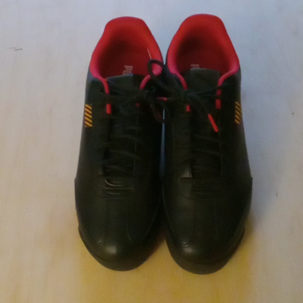 Brand new..never worn, Puma Ferrari sneakers (lows)..black, red & yellow-size12